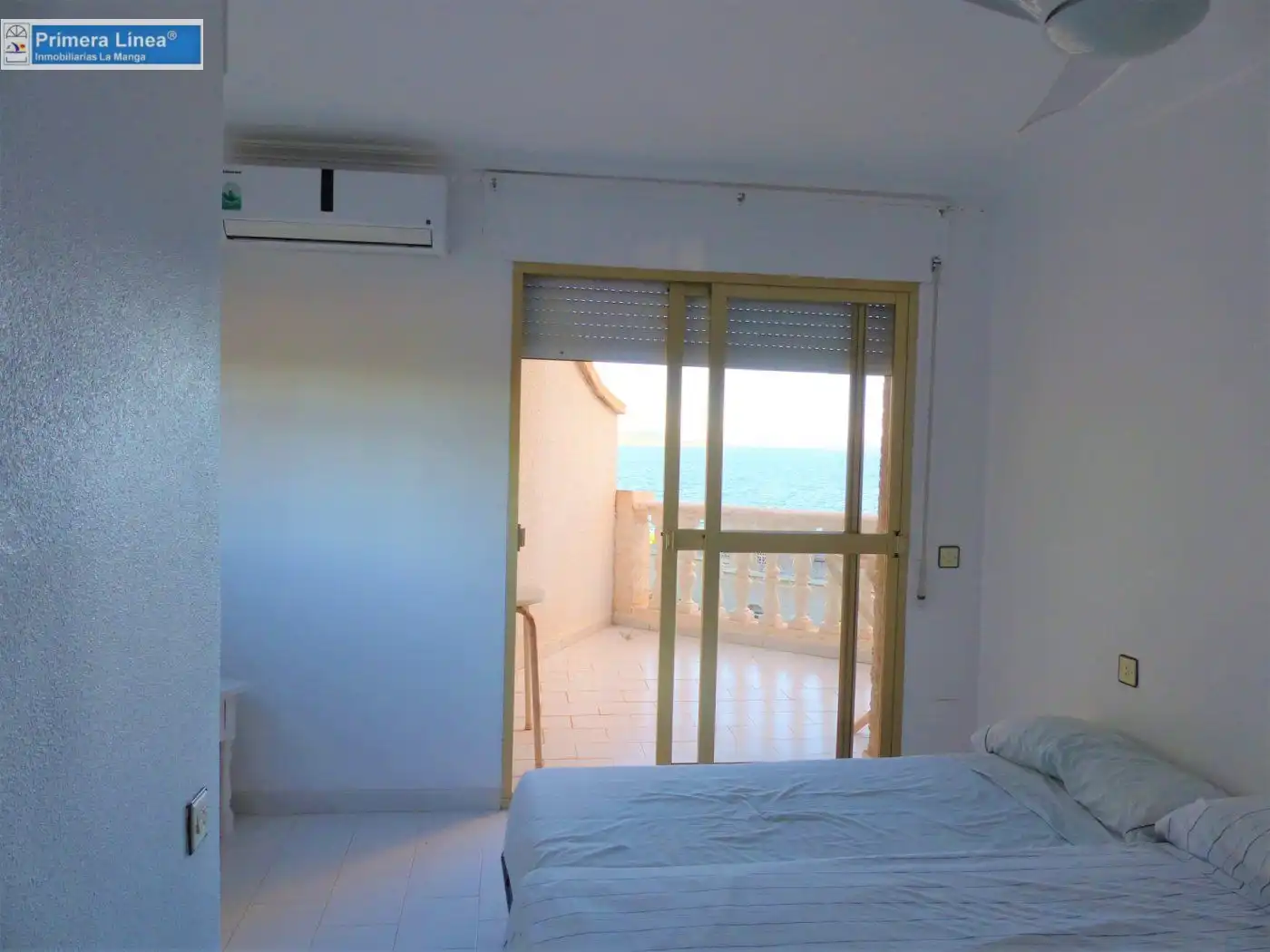 Habitación de Casa adosada en venta en La Manga del Mar Menor con Aire acondicionado, Terraza y Amueblado