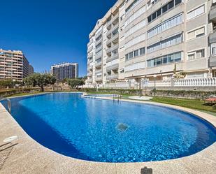 Swimming pool of Flat for sale in Villajoyosa / La Vila Joiosa  with Air Conditioner, Private garden and Terrace