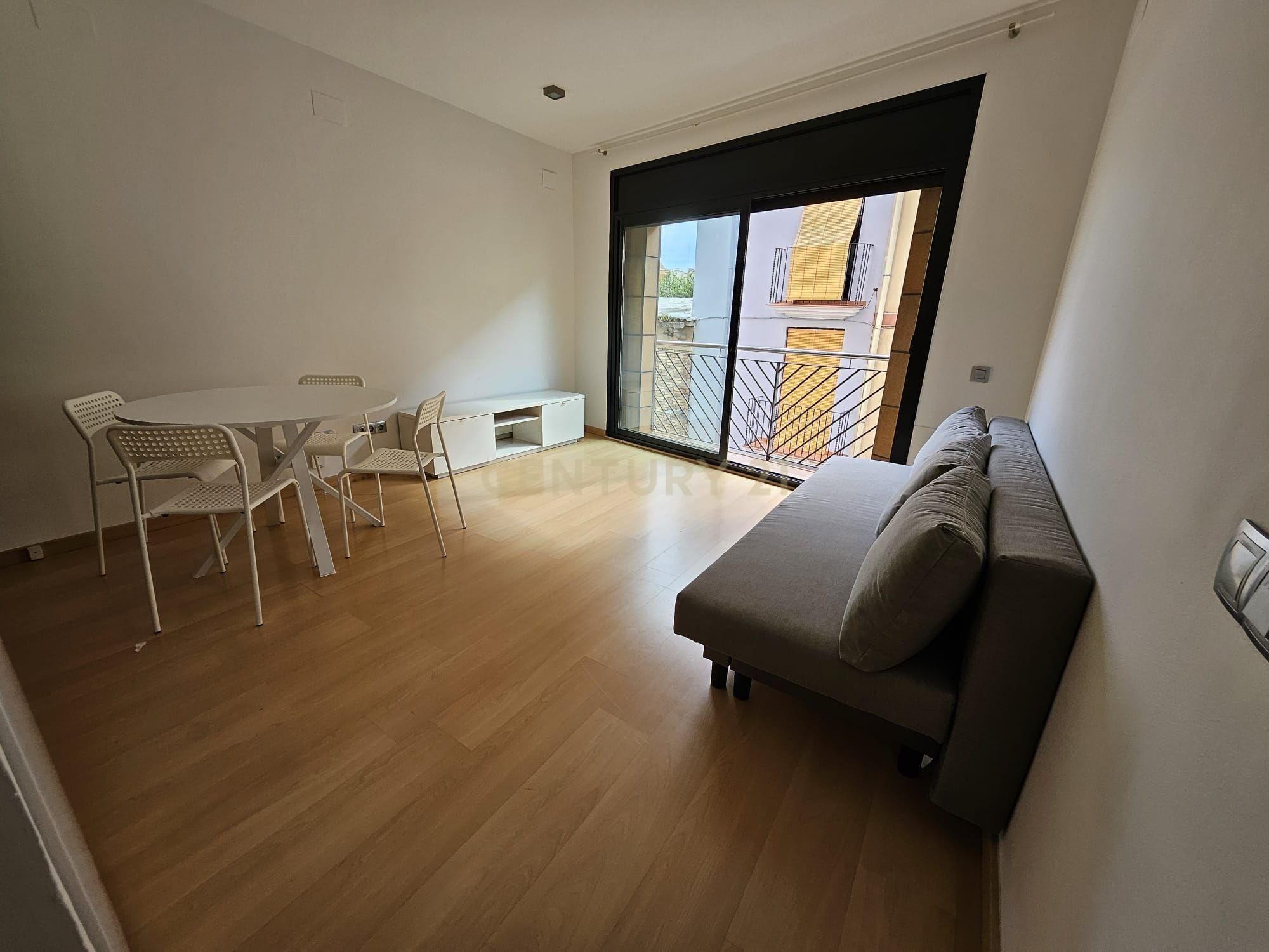 Living room of Apartment to rent in Vilanova i la Geltrú  with Air Conditioner, Microwave and Balcony