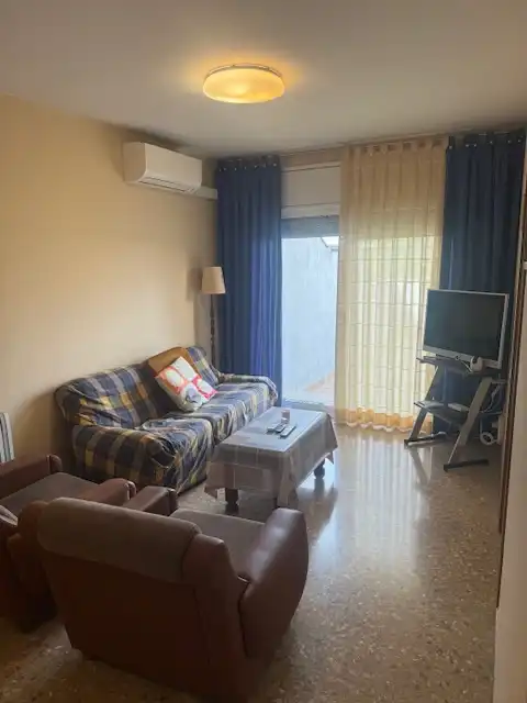 Sala d'estar de Casa o xalet de lloguer en Terrassa amb Aire condicionat, Jardí privat i Moblat