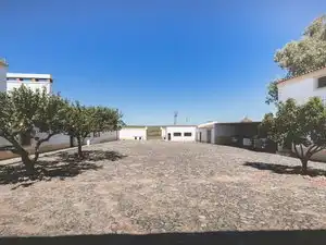 Vista exterior de Finca rústica en venda en Badajoz amb Jardí privat, Terrassa i Piscina