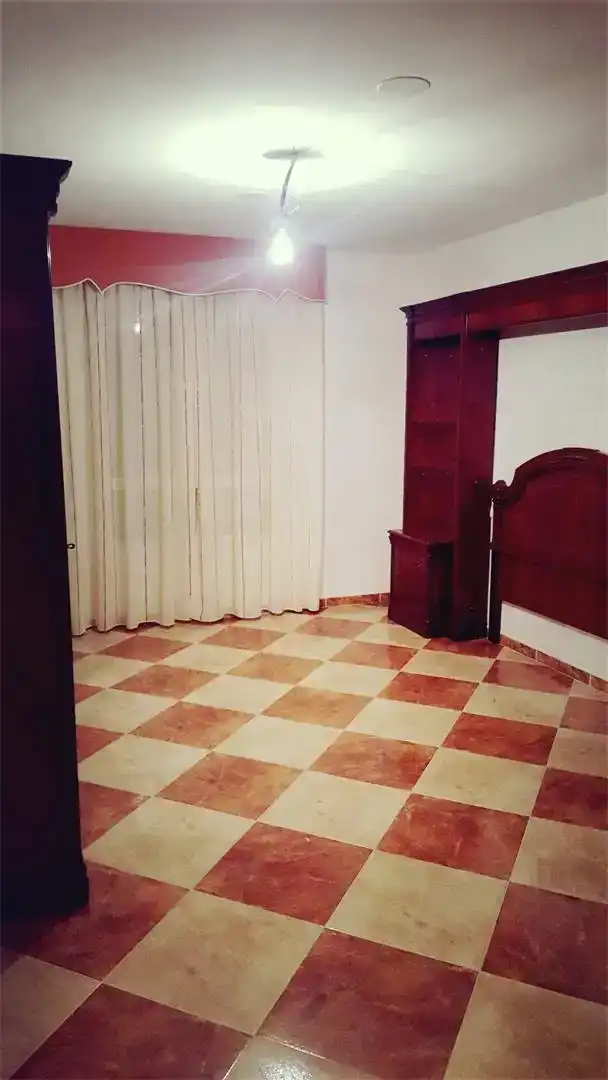 Sala d'estar de Casa adosada en venda en Baza amb Forn, Rentadora i Microones