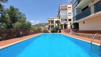 Swimming pool of Flat for sale in Sitges  with Heating, Parquet flooring and Storage room