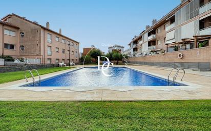 Swimming pool of Flat for sale in Cubelles  with Air Conditioner, Terrace and Balcony