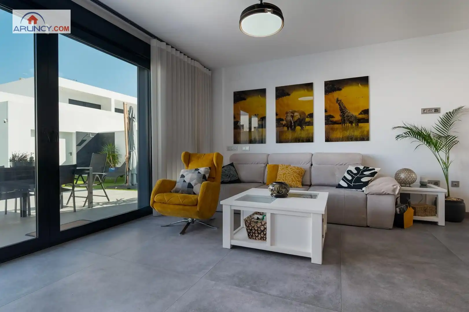 Sala de estar de Casa adosada en venta en Dos Hermanas con Aire acondicionado, Jardín privado y Terraza