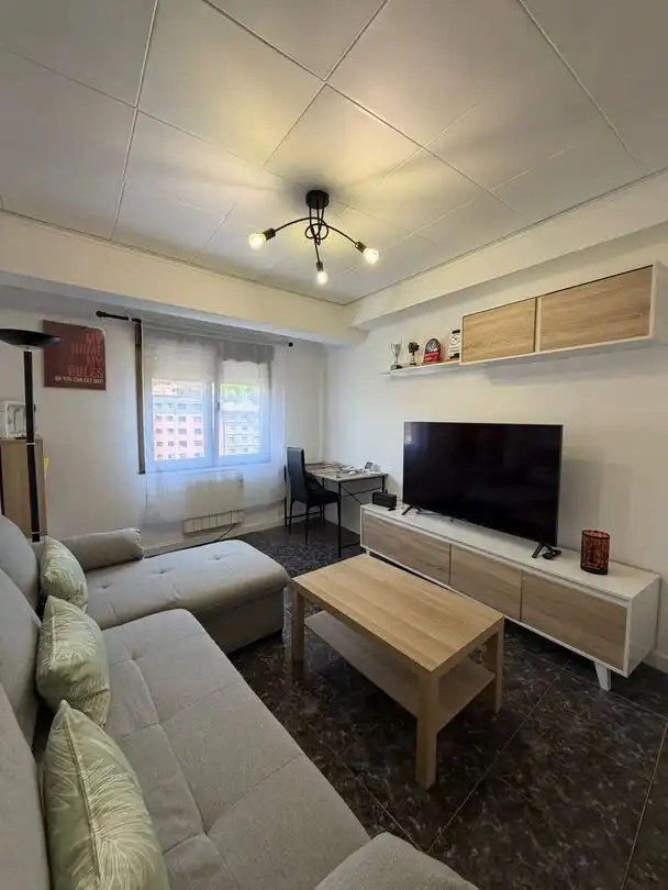 Sala de estar de Piso en venta en Langreo con Calefacción, Trastero y Amueblado