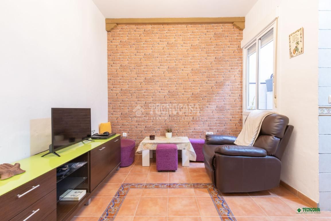 Sala d'estar de Casa adosada en venda en  Almería Capital