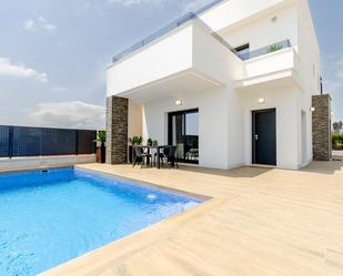 Swimming pool of Single-family semi-detached for sale in Orihuela  with Air Conditioner, Heating and Private garden