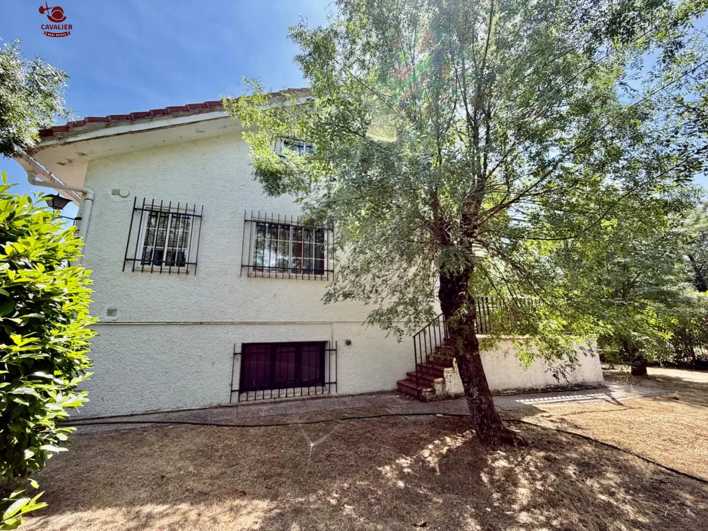 Vista exterior de Casa o xalet en venda en Guadarrama amb Calefacció, Jardí privat i Terrassa