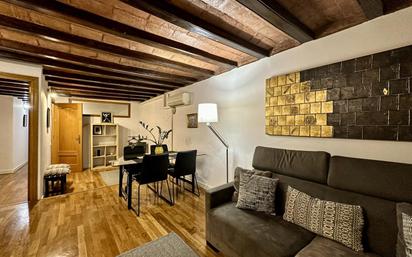 Living room of Planta baja for sale in  Barcelona Capital  with Heating, Parquet flooring and Balcony