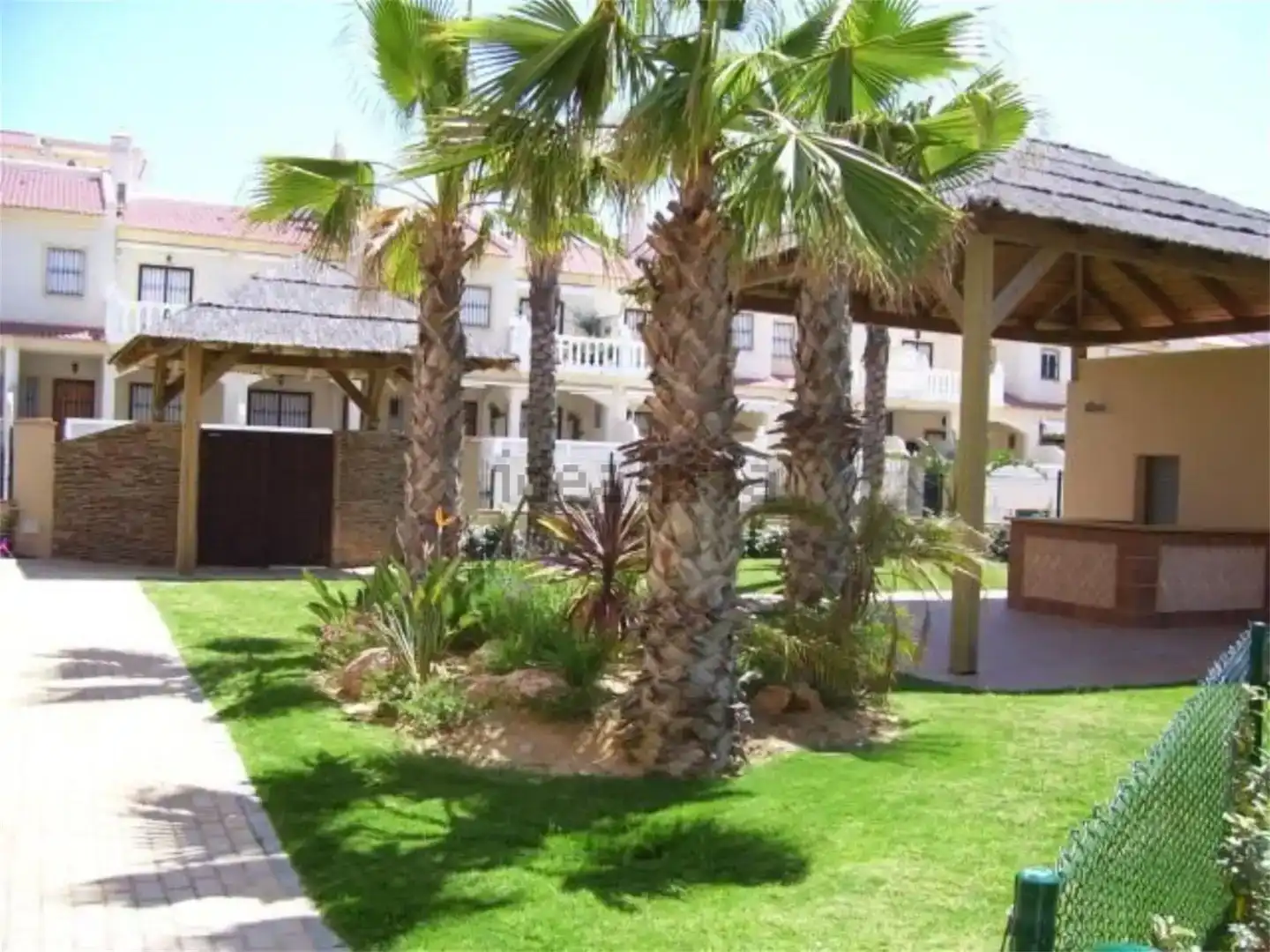 Außenansicht von Wohnung zur Miete in La Antilla mit Klimaanlage, Privatgarten und Parkett