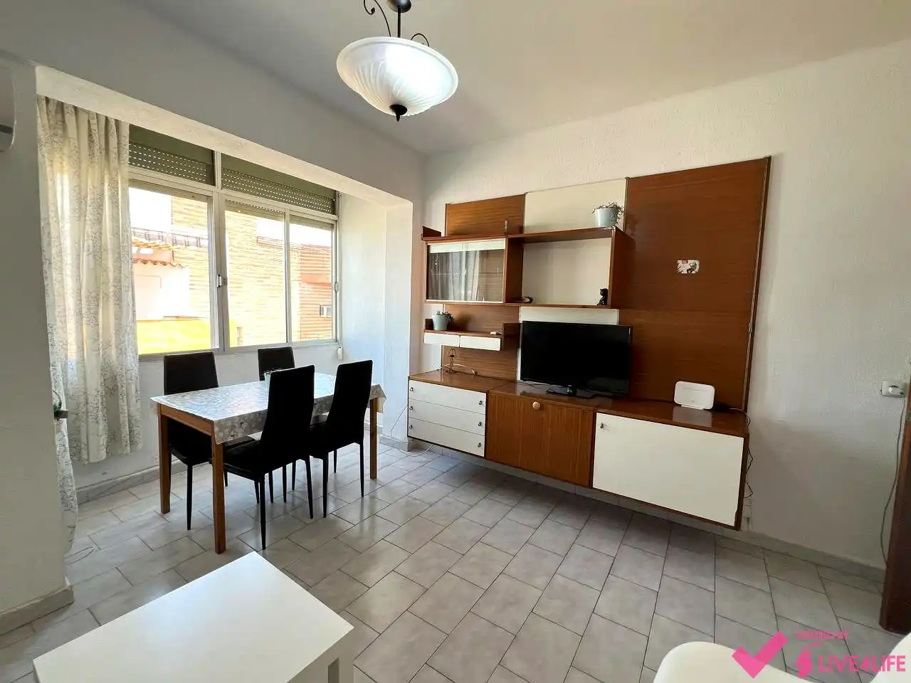 Sala de estar de Piso para compartir en Sevilla con Aire acondicionado, Calefacción y Amueblado