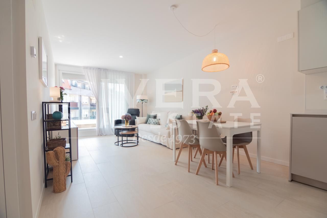 Sala de estar de Piso en venta en Sanxenxo con Calefacción, Terraza y Trastero