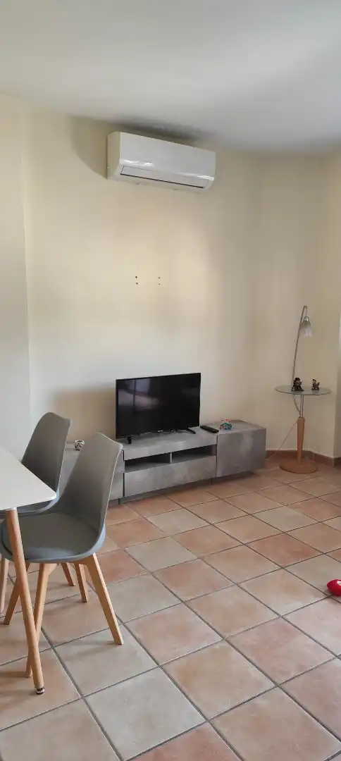 Sala de estar de Casa adosada en venta en Lentegí con Aire acondicionado, Calefacción y Terraza