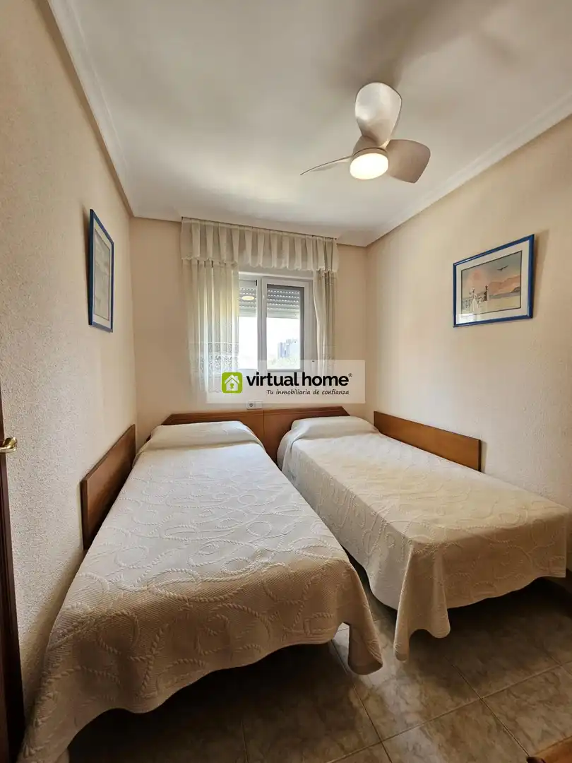 Bedroom of Flat for sale in Benidorm  with Air Conditioner, Terrace and Furnished