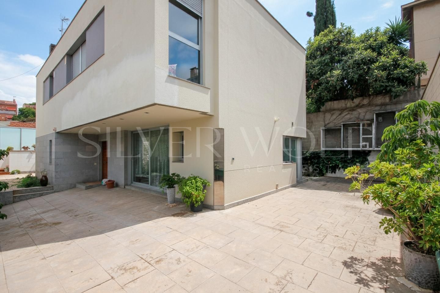 Exterior view of House or chalet for sale in Santa Coloma de Gramenet  with Air Conditioner, Heating and Private garden