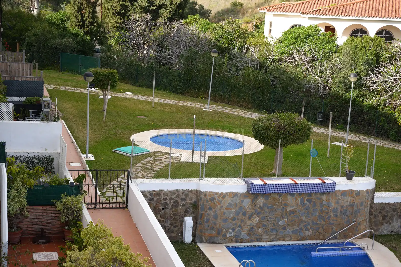 Swimming pool of Flat for sale in Benalmádena  with Air Conditioner, Storage room and Oven