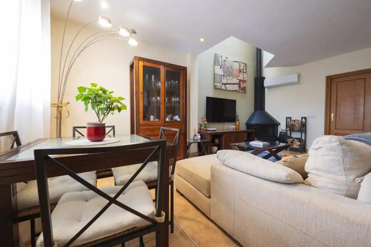 Sala d'estar de Casa adosada en venda en Sant Antoni de Portmany amb Aire condicionat, Calefacció i Jardí privat