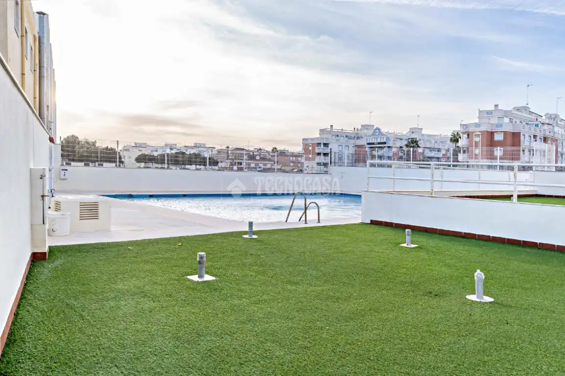 Swimming pool of Flat for sale in Roquetas de Mar  with Air Conditioner and Heating