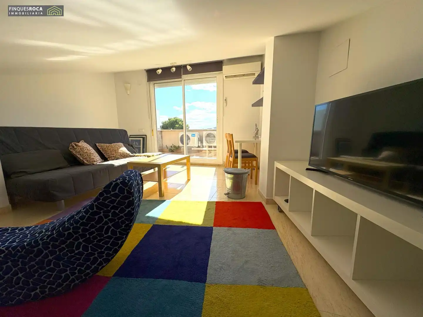 Sala d'estar de Casa adosada en venda en La Ràpita amb Aire condicionat, Jardí privat i Terrassa