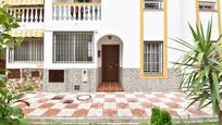 Vista exterior de Casa adosada en venda en Otura amb Aire condicionat, Calefacció i Jardí privat