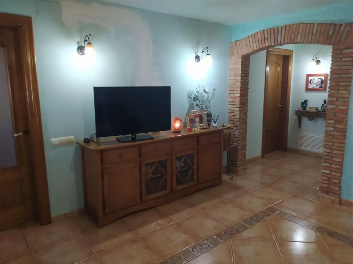Sala d'estar de Casa adosada en venda en Deltebre amb Aire condicionat i Balcó