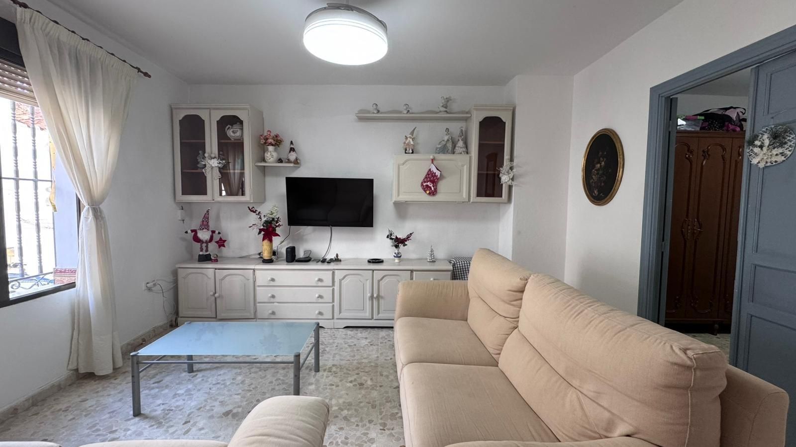 Sala d'estar de Casa adosada en venda en Colmenar amb Aire condicionat, Calefacció i Terrassa