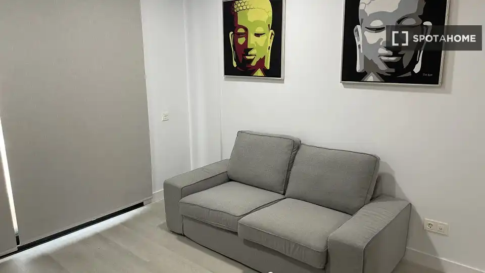 Sala de estar de Estudio para compartir en Mogán con Aire acondicionado, Terraza y Amueblado
