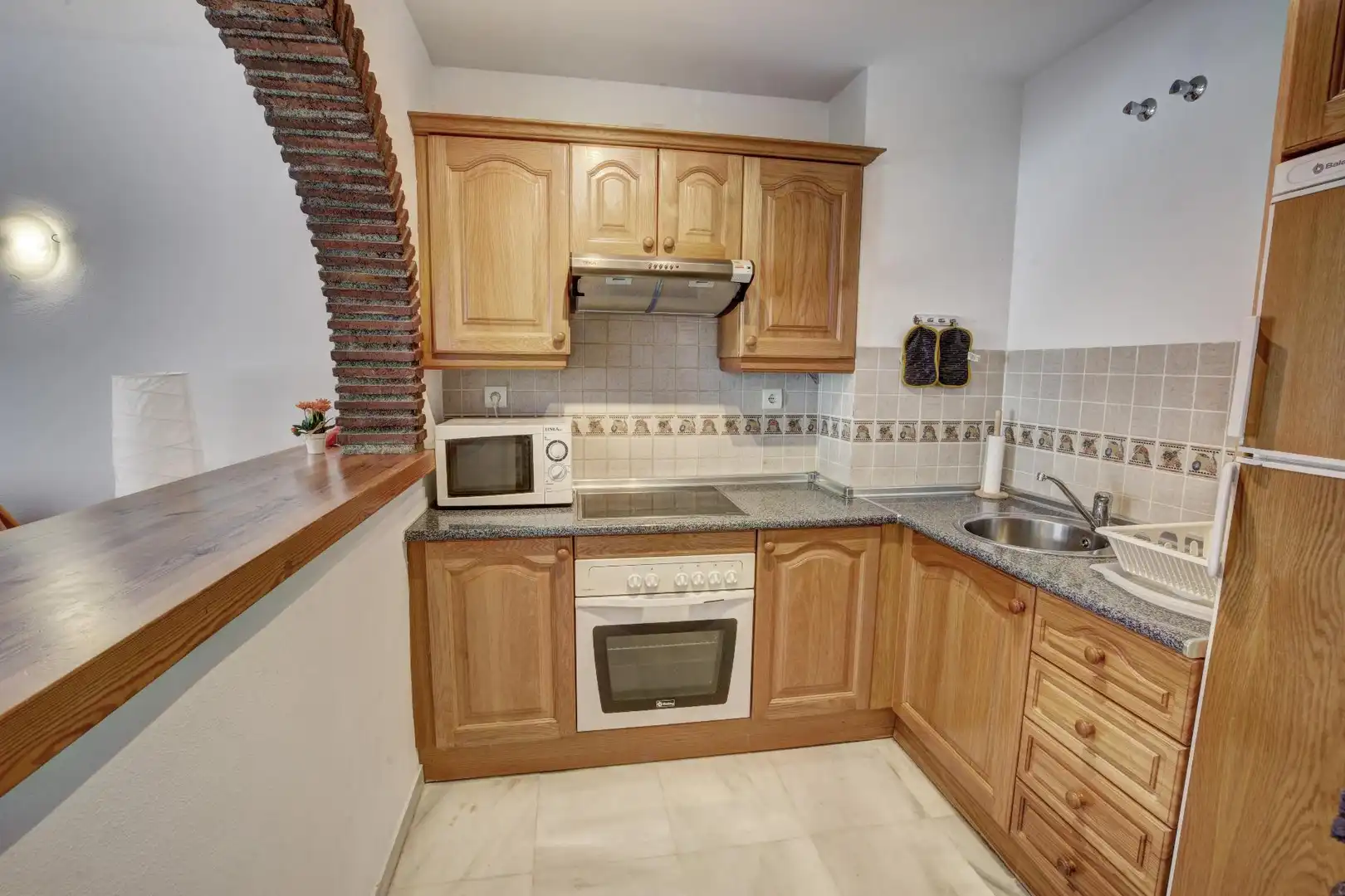 Cocina de Apartamento en venta en Benalmádena con Aire acondicionado, Calefacción y Jardín privado