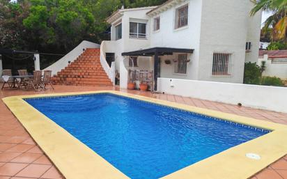 Swimming pool of House or chalet for sale in Moraira  with Air Conditioner