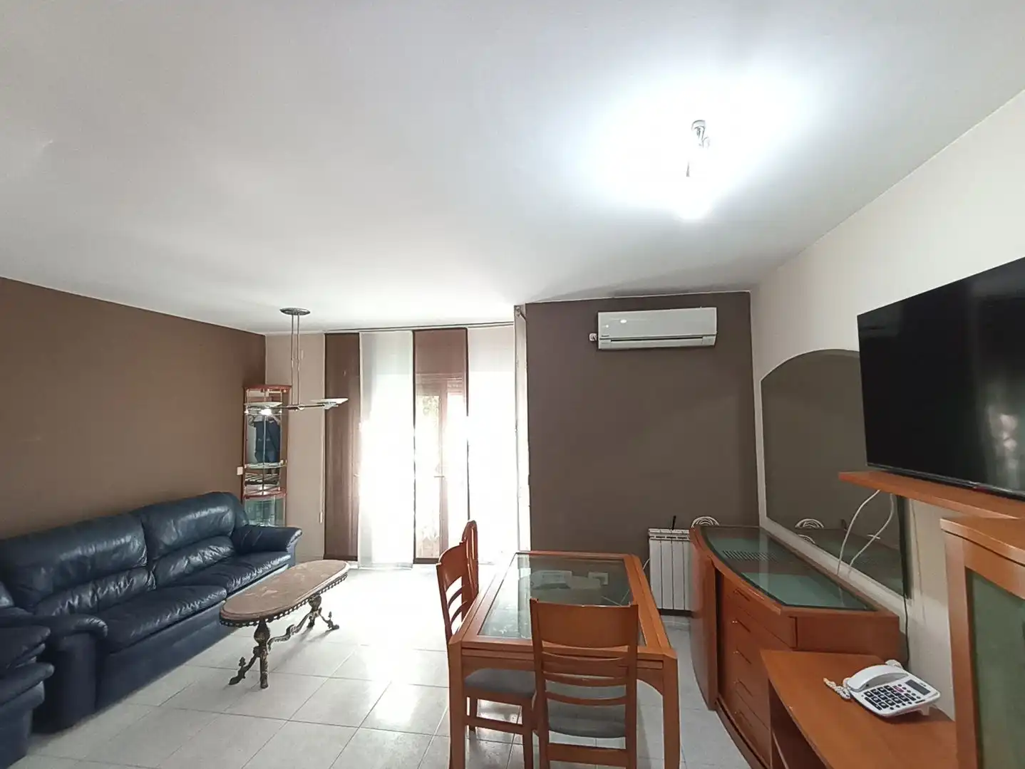 Sala d'estar de Casa adosada en venda en Reus amb Aire condicionat, Calefacció i Parquet
