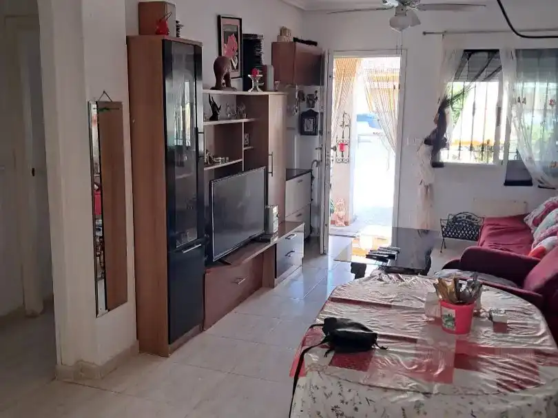 Sala d'estar de Pis en venda en Pilar de la Horadada amb Aire condicionat i Piscina