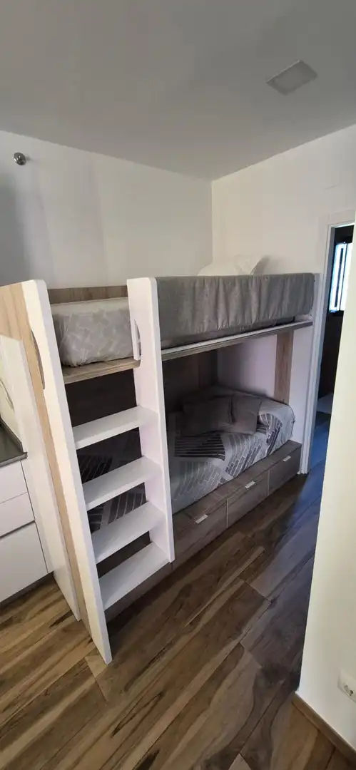 Schlafzimmer von Wohnungen zur Miete in Punta Umbría mit Klimaanlage, Heizung und Möbliert