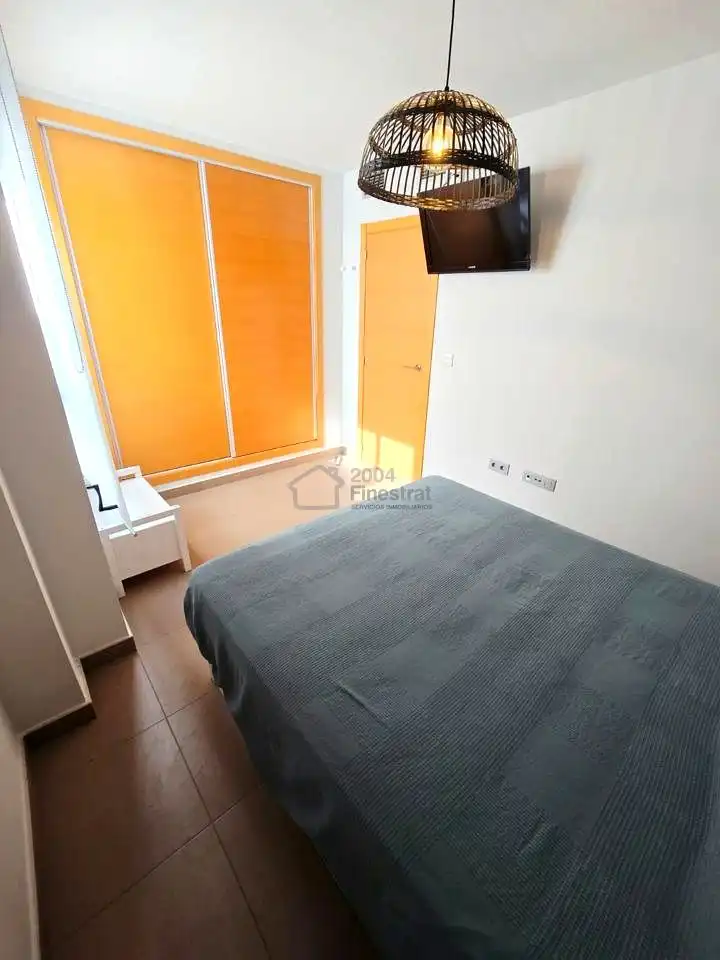 Bedroom of Flat for sale in Benidorm  with Air Conditioner, Terrace and Furnished