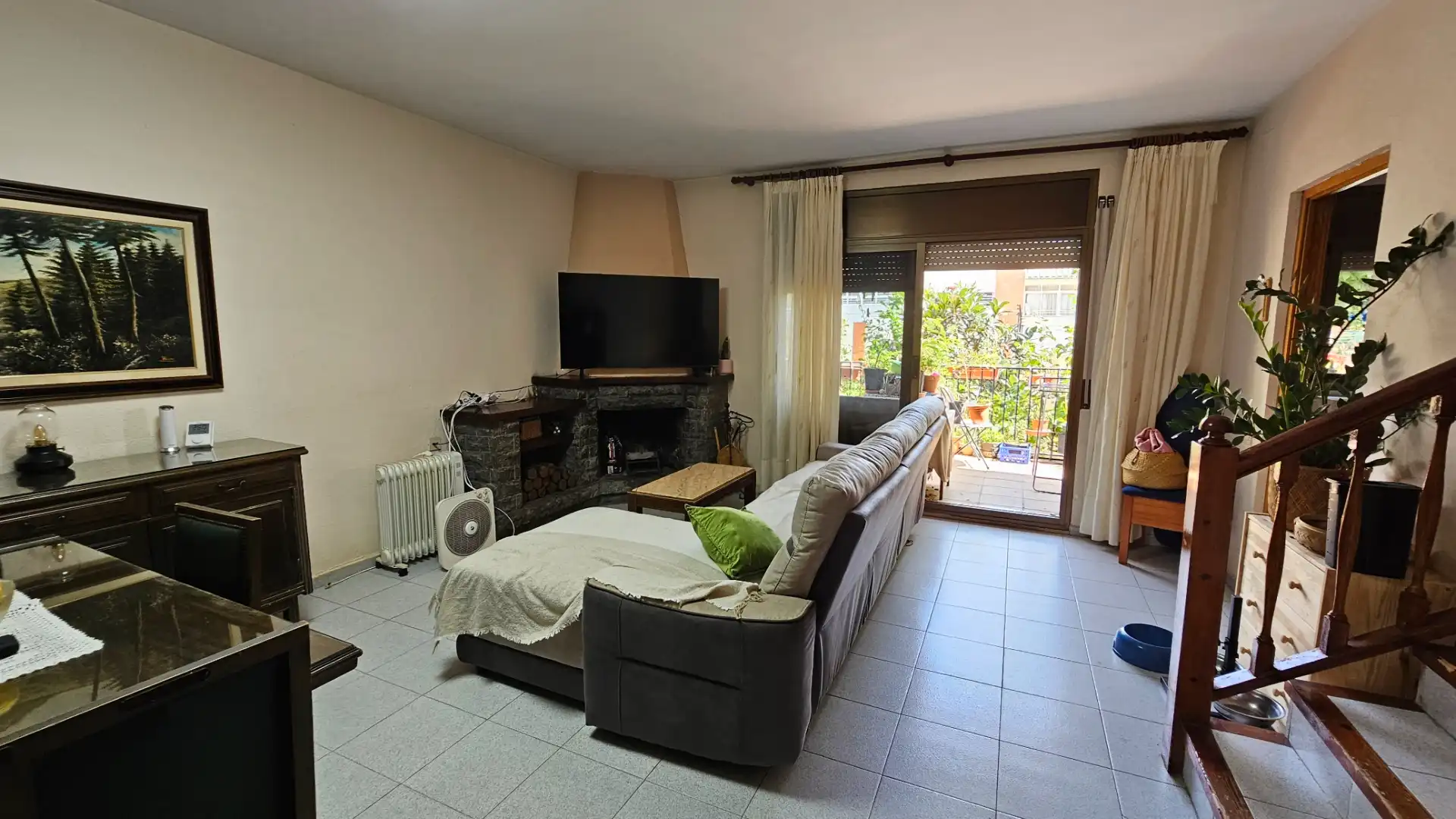 Sala d'estar de Casa adosada en venda en Sabadell amb Calefacció, Terrassa i Forn