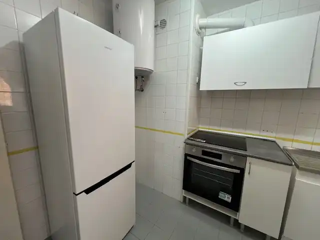 Cuina de Pis de lloguer en Puertollano amb Aire condicionat, Calefacció i Moblat