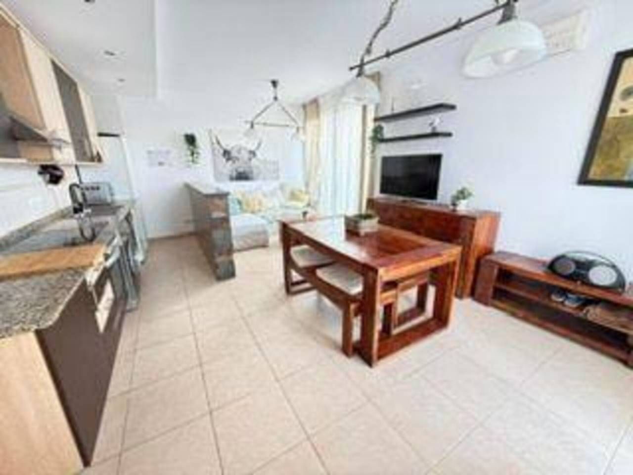 Sala de estar de Casa adosada en venta en Mont-roig del Camp con Aire acondicionado y Piscina comunitaria