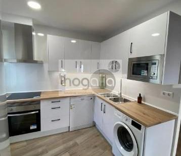 Kitchen of Flat to rent in  Sevilla Capital  with Air Conditioner and Furnished