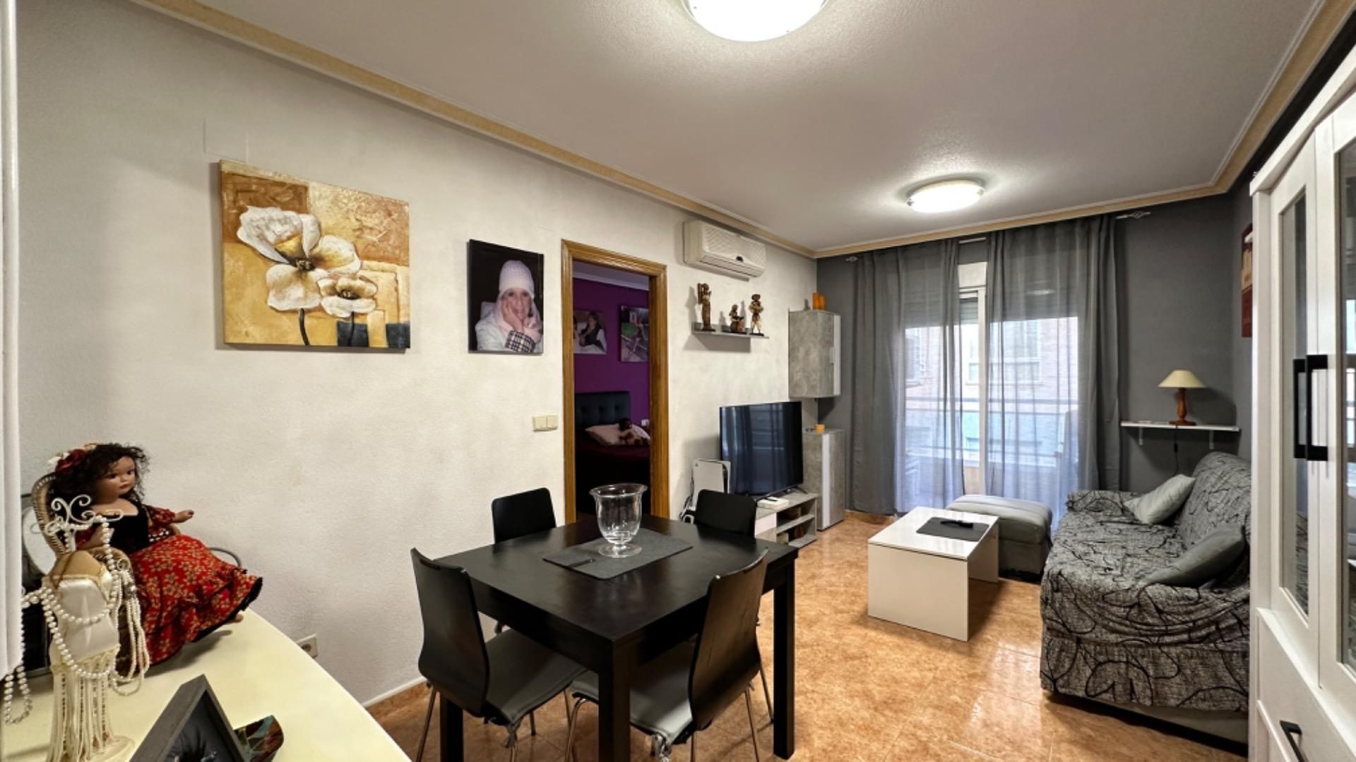 Living room of Apartment for sale in Torrevieja  with Air Conditioner, Terrace and Storage room