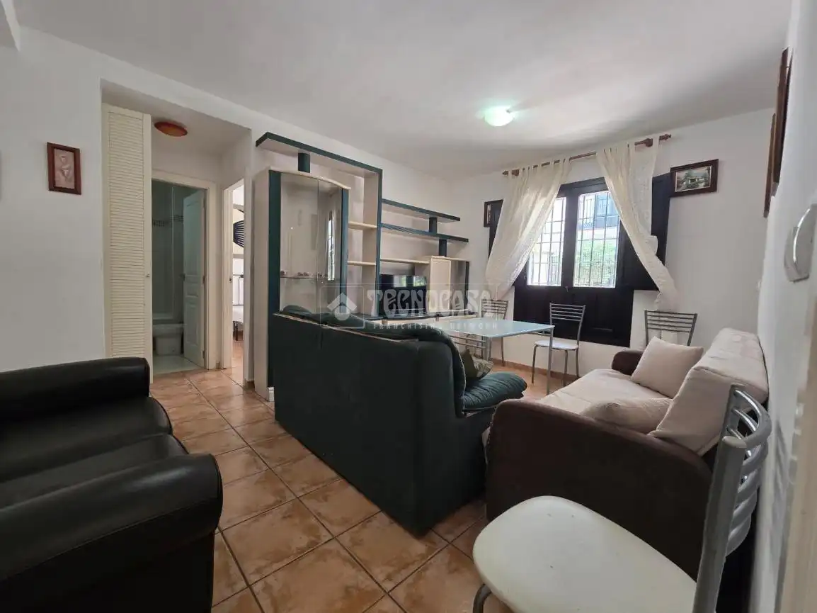 Sala de estar de Piso en venta en Vélez de Benaudalla con Aire acondicionado, Terraza y Piscina comunitaria