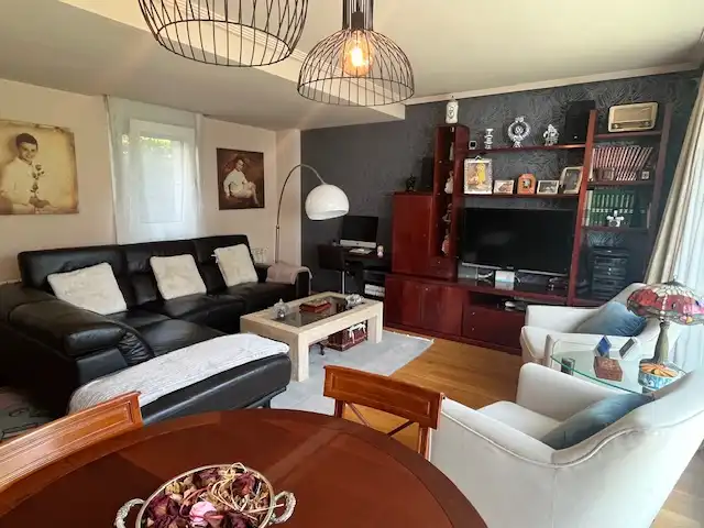 Sala d'estar de Casa adosada en venda en Santander amb Calefacció, Jardí privat i Parquet