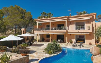 Exterior view of House or chalet for sale in Santa Eulària des Riu  with Air Conditioner, Terrace and Swimming Pool