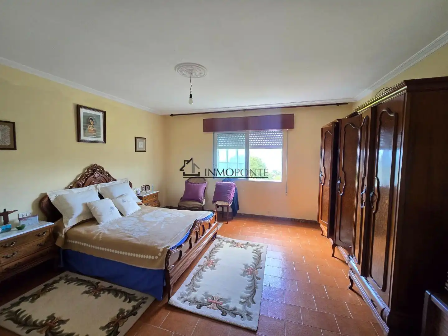 Dormitori de Casa o xalet en venda en Pontevedra Capital  amb Jardí privat