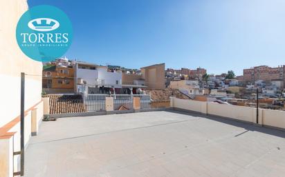 Exterior view of Single-family semi-detached for sale in Málaga Capital  with Terrace and Storage room