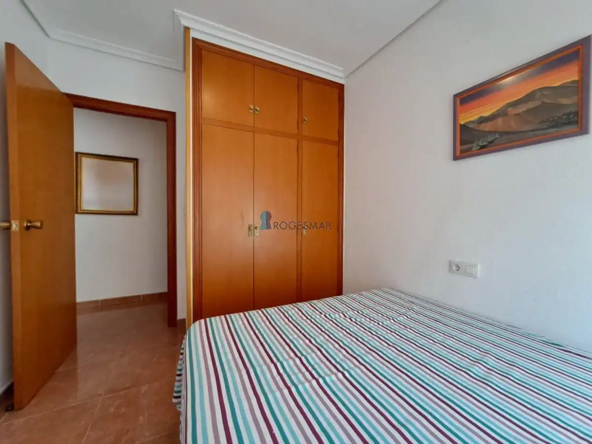 Dormitori de Apartament en venda en Benicasim / Benicàssim amb Terrassa, Traster i Piscina comunitària