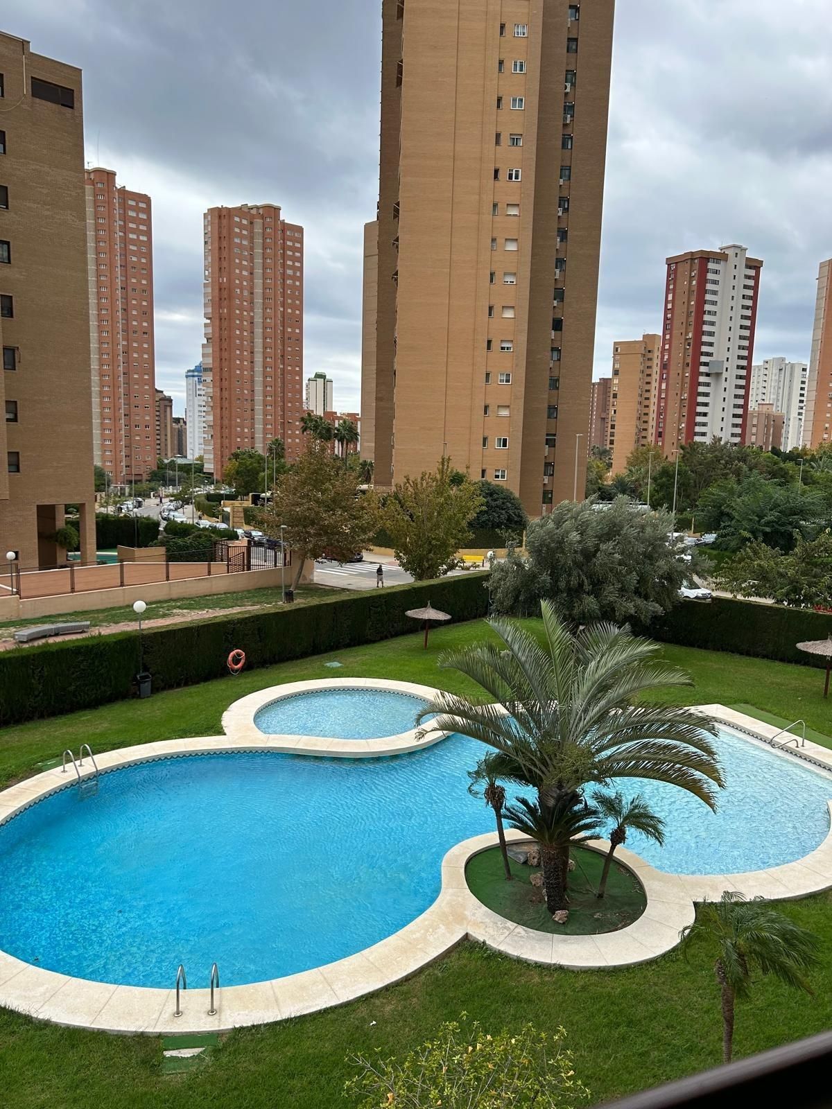 Swimming pool of Flat for sale in Benidorm  with Air Conditioner, Private garden and Terrace