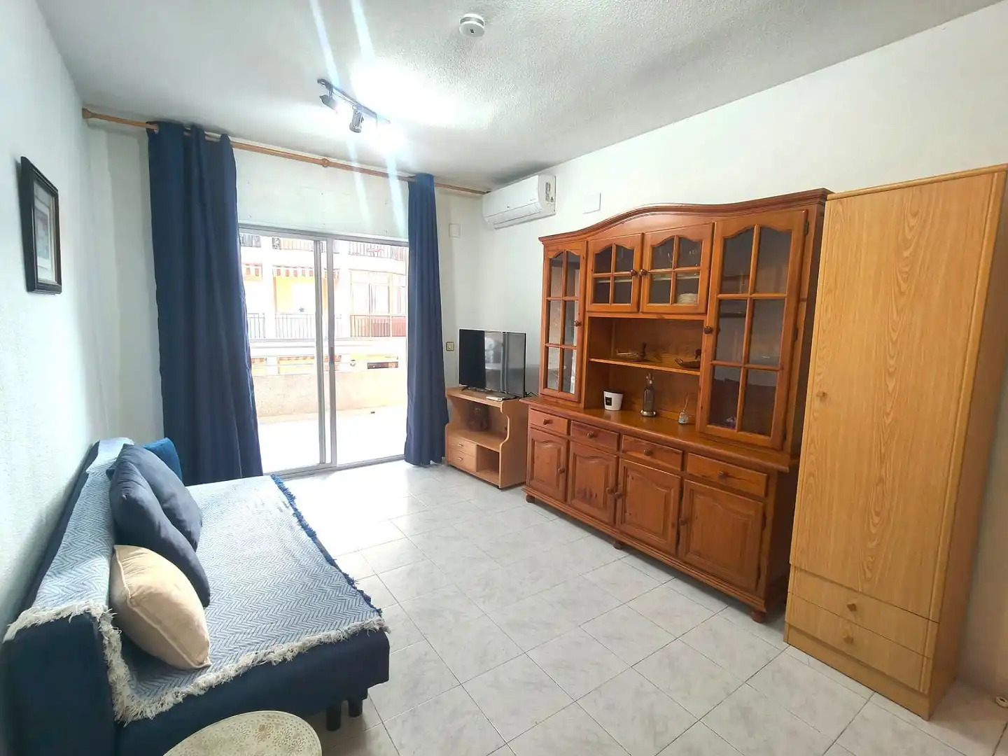 Sala d'estar de Apartament de lloguer en Santa Pola amb Aire condicionat, Calefacció i Terrassa