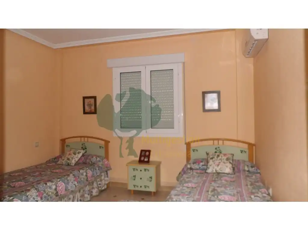 Habitación de Casa adosada en venta en Cáceres