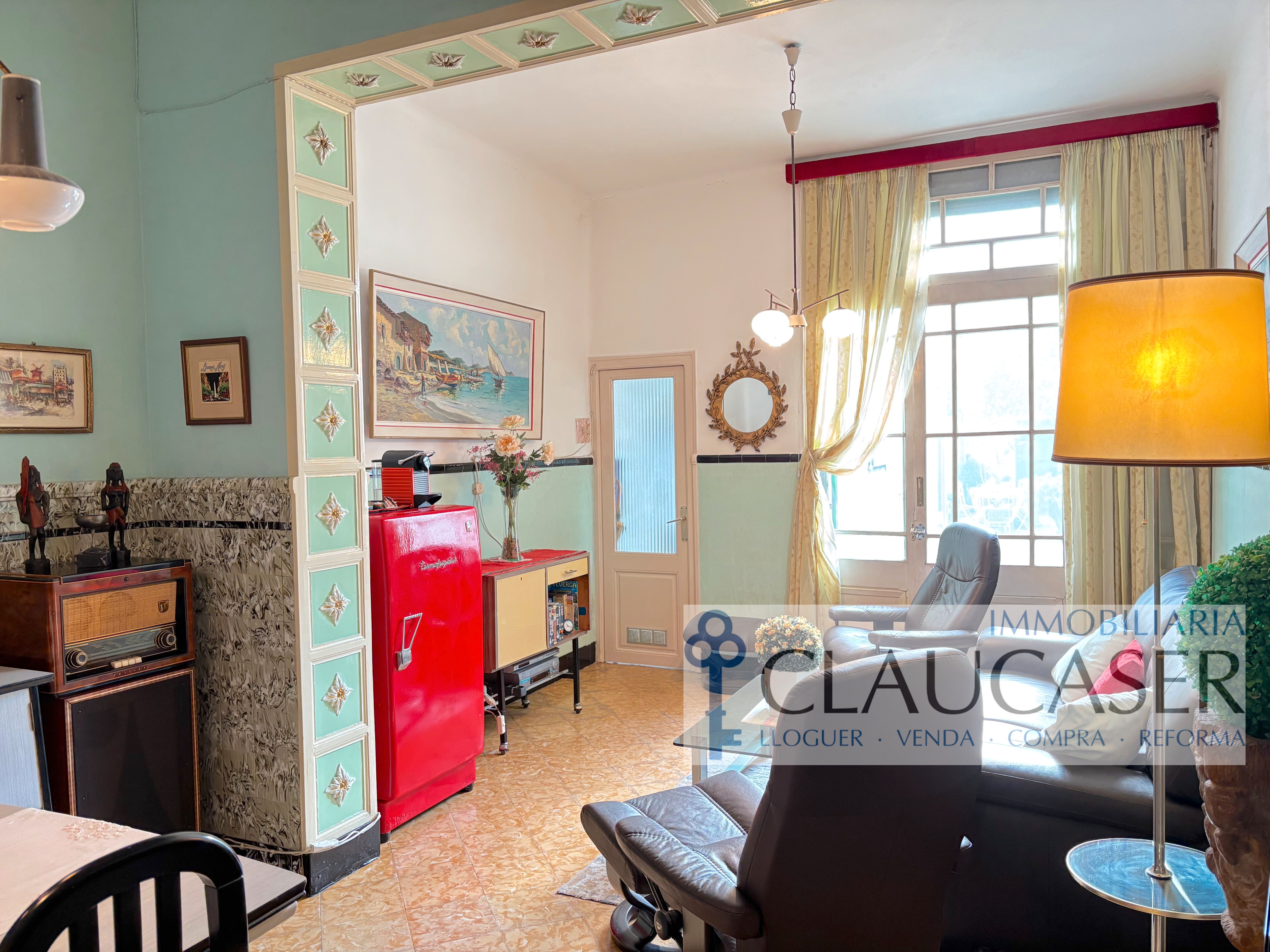 Sala de estar de Casa adosada en venta en Sabadell