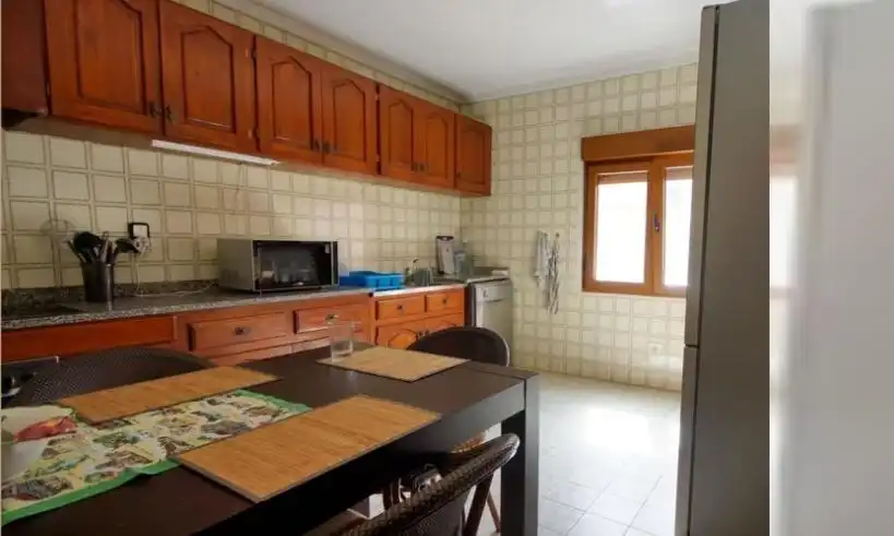 Cuina de Casa adosada en venda en Calpe / Calp amb Aire condicionat, Jardí privat i Terrassa